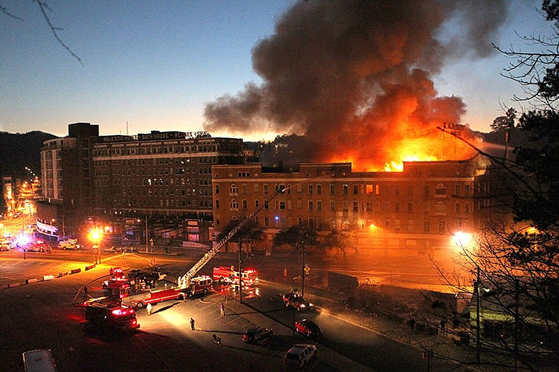 Hot Springs Fire Department firefighters battle ablaze at the vacent Majestic Hotel Thursday, February 27, 2014. (The Sentinel-Record/Richard Rasmussen)