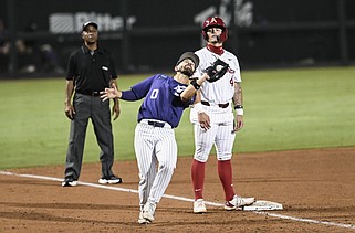 Kansas State infielder Jaden Parsons (0) forces an out against the Arkansas Razorbacks during the eighth inning of Game 4 of the Fayetteville Regional at Baum-Walker Stadium in Fayetteville on Saturday, June 1, 2024. (NWA Democrat-Gazette/Charlie Kaijo)