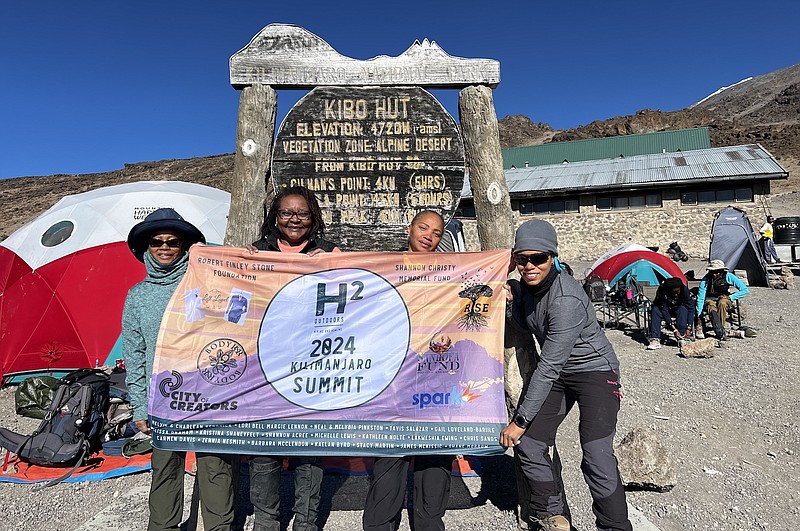 Contributed photo / From left, Patricia Washington, Shawanna Kendrick, Terri Roshell and Melony Collins stand for a photo at basecamp atop Mount Kilimanjaro. Five Black women from Chattanooga set out in June to climb and summit Kilimanjaro, Africa's highest point and the tallest freestanding mountain in the world.