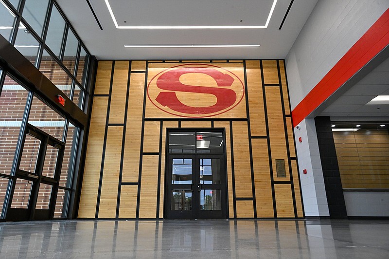 The ‘Super S’ and surrounding pieces from the old Springdale basketball court have been relocated to the school’s new arena. Construction on the new additions began in 2022 and is currently projected to be finished in August. The new gym includes the main gym as well as a separate auxiliary gym, a trophy display, locker rooms and coaches offices.
(NWA Democrat-Gazette/Caleb Grieger)