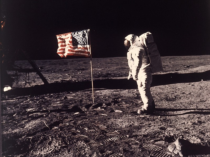 FILE - In this photo provided by NASA, astronaut Edwin "Buzz" Aldrin poses for a photograph beside the U.S. flag deployed on the moon during the Apollo 11 mission on July 20, 1969. (Neil Armstrong/NASA via AP, File)