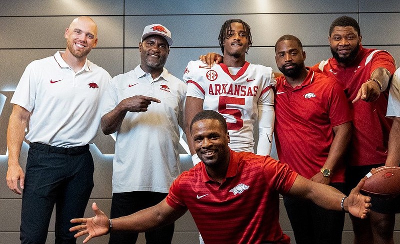 Arkansas commitment Nigel Pringle hanging out with the Razorback staff during his official visit to Fayetteville.