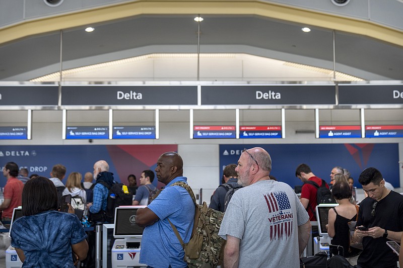 US is investigating Delta's flight cancellations and faltering response