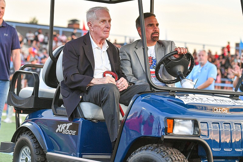 Longtime Fort Smith Public Schools coach and athletic director Jim Rowland (left) served the school system for 53 years, but was known to many as simply ‘Coach.’ Rowland died Wednesday at 83.
(River Valley Democrat-Gazette/Hank Layton)