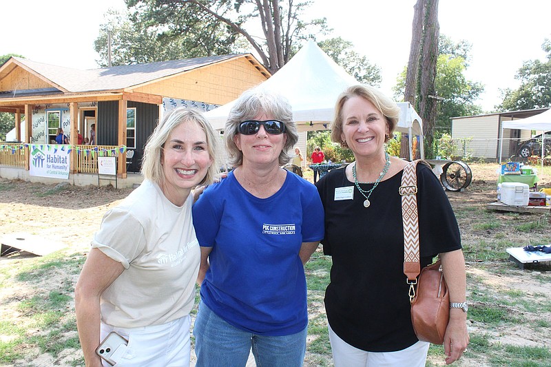 Kelly Fleming, executive director of Habitat for Humanity of Central Arkansas, Karen Ross and Ashley Coldiron