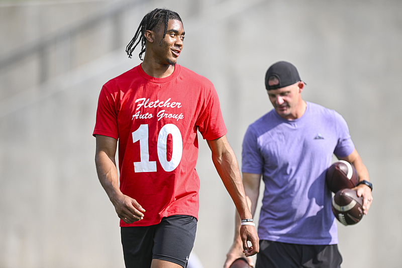 University Of Arkansas Quarterback Taylen Green Tosses Balls, Gives ...