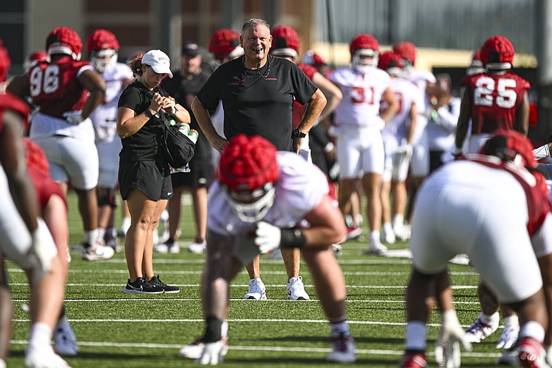 Arkansas head coach Sam Pittman (center) looks on, Wednesday, July 31, 2024, during the Razorbacks' first preseason practice at the Walker Pavilion in Fayetteville. Visit nwaonline.com/photo for today's photo gallery..(NWA Democrat-Gazette/Hank Layton)