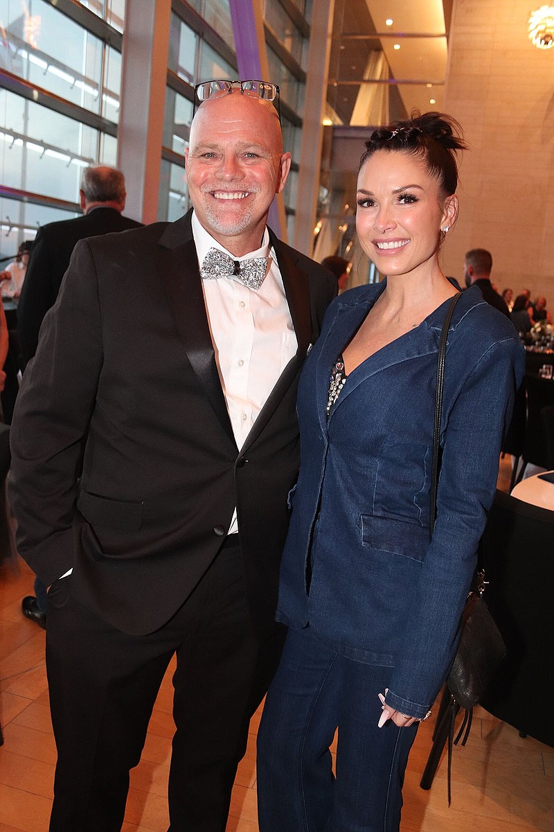 Next Step co-founder/director Jimmy McGill with Tara Conner of Los Angeles at the Denim and Diamonds Gala, the inaugural fundraiser for Next Step Recovery Housing in Clarksville. The event took place July 20 in the Great Hall of the Clinton Presidential Center in Little Rock..(Arkansas Democrat-Gazette -- Helaine R. Williams)