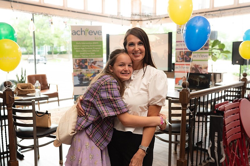 Blakeley and Lola Nolte at the UCP of Arkansas 65th birthday celebration and launch of its new name, Achieve Community Alliance, on July 25, 2024, at Nexus Coffee & Creative in Little Rock.(Special to the Democrat-Gazette -- Lucy Baehr)