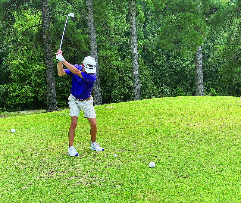 El Dorado's Peyton Yarbrough hits a tee shot Monday while competing in the Simmons Bank Wildcat Invitational at the Lion's Club.