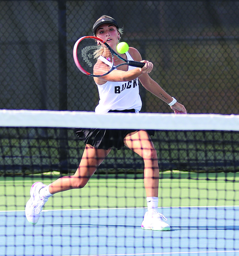 Smackover's Taylor Darden returns a shot against Hampton during the season-opening tennis match Thursday at Southern Arkansas University in Magnolia.