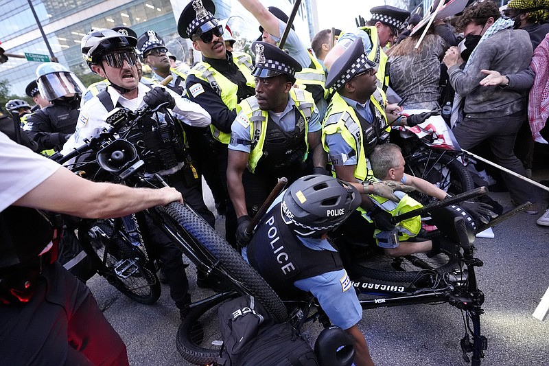 Pro-Palestinian protesters clash with police near Chicago's Israeli ...