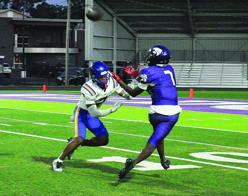 A North Little Rock defensive back breaks up a pass intended for El Dorado's AJ Gilmore during Friday's benefit game at Memorial Stadium. Gilmore will start at both receiver and safety for the Wildcats this season. El Dorado hosts Little Rock Christian Friday, beginning at 7 p.m.