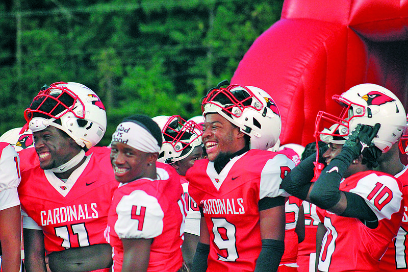 Getting the last laugh

Seniors Jakayson Harper (11) Trent Haygood (4), Kamari McAdoo (9) and Xavier McHenry (10) share a laugh during the lightning delay on Friday night. The Cardinals were in a back and forth game with a solid Arkadelphia squad before pulling away late to win 40-25. The Camden News will have more on this game online later today.