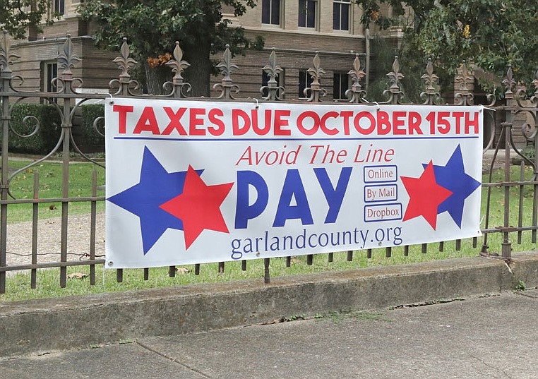 A sign at the Garland County Court House in 2020 reminds property owners of the deadline to pay their taxes by Oct. 15. (The Sentinel-Record/File)