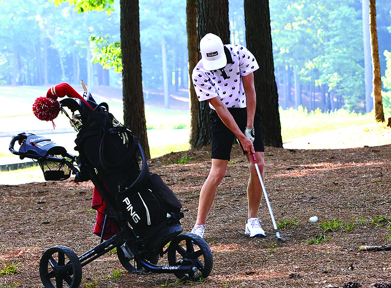 Smackover's Judson Wolfe chips a shot in action this season. The junior will compete in the 3A Boys State Golf Tournament Monday in Melbourne.