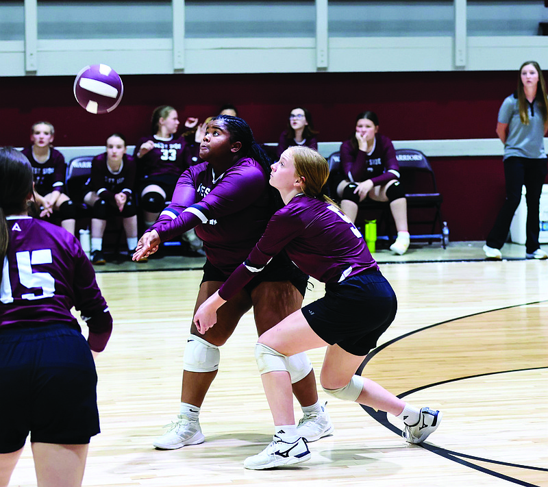 West Side Christian's Vivian Conley and Carley Bain look to volley in action this season. The Lady Warriors will compete in the Heartland Christian Athletic Association 2A Volleyball Tournament Friday in Tulsa.