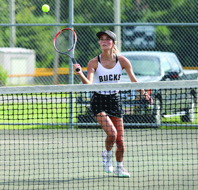 Smackover's Taylor Darden closes in on a shot at the net in action this season. Darden will open play in girls singles Monday at the 3A State Tennis Tournament in Conway.