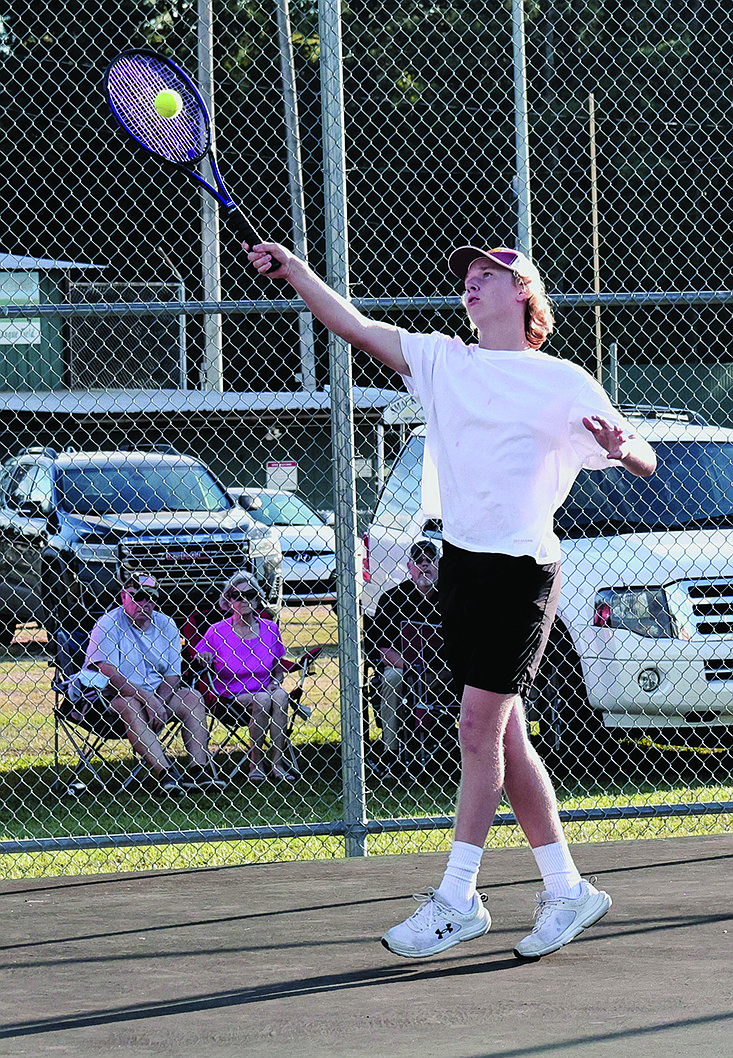 Smackover's Parker Evans returns a shot during action this season. Evans, who is undefeated, will compete in the 3A State Tennis Tournament Monday in Conway.