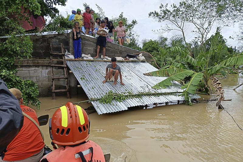 Tropical storm battering Philippines leaves at least 24 people dead in ...