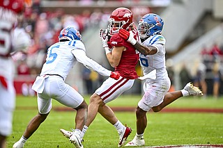 Ole Miss overwhelms Arkansas at Fayetteville; 63-31 loss is Hogs’ most ...