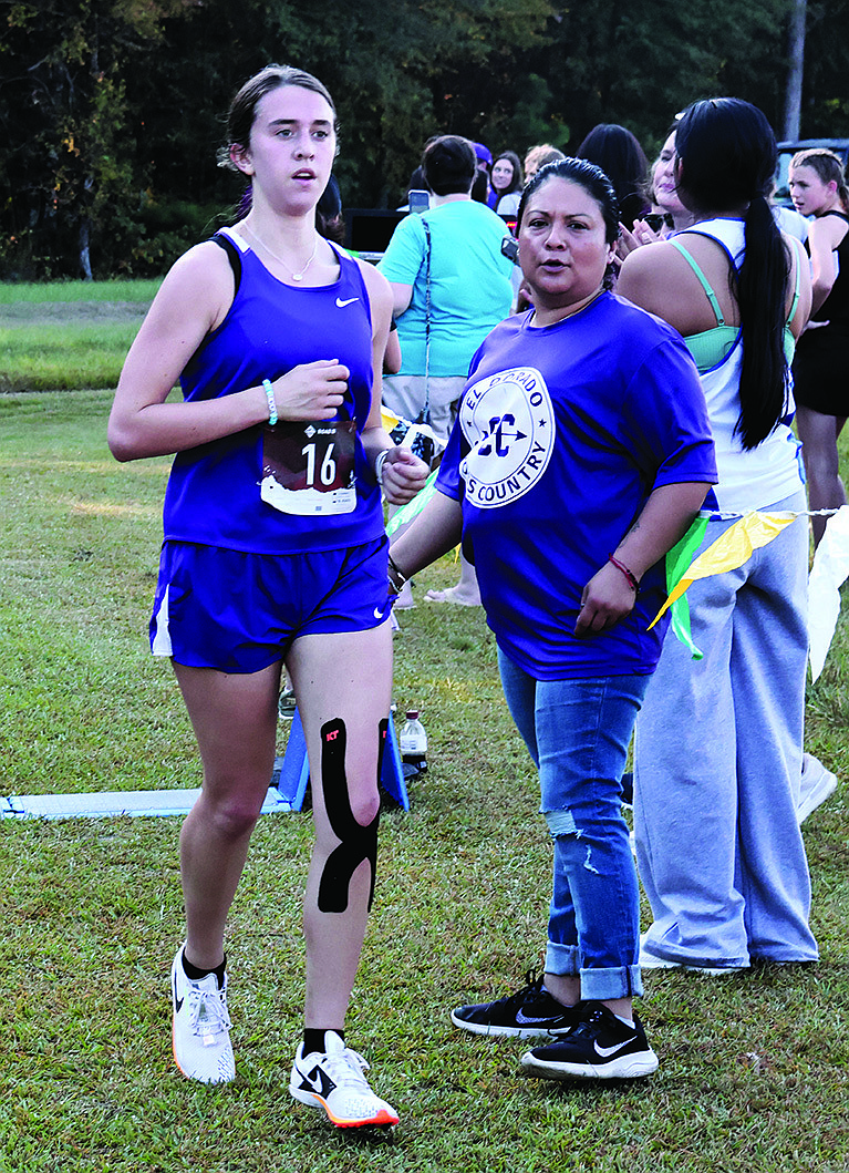 El Dorado's Ainsley Colvin crosses the finish line at the Wildcat Invitational this season. The Lady Wildcats will compete in the 5A State Cross Country Championships Thursday in Hot Springs.