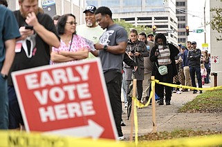 People wait in line to vote Monday, Nov. 4, 2024 at the Pulaski County Election Commission in downtown Little Rock..(Arkansas Democrat-Gazette/Staci Vandagriff)