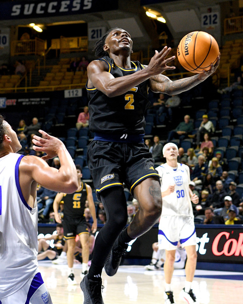 Staff Photo by Robin Rudd / UTC;s Trey Bonham (2) scores on a layup. The University of Tennessee at Chattanooga Mocs hosted the Tennessee Wesleyan Bulldogs at McKenzie Arena on December 18, 2024.