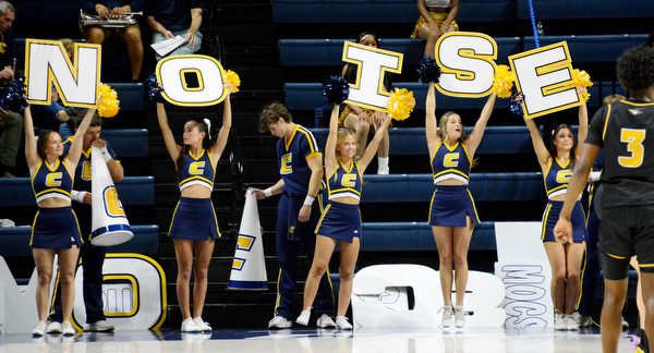 Staff Photo by Robin Rudd / The Mac Cheerleaders call for noise. The University of Tennessee at Chattanooga Mocs hosted the Tennessee Wesleyan Bulldogs at McKenzie Arena on December 18, 2024.