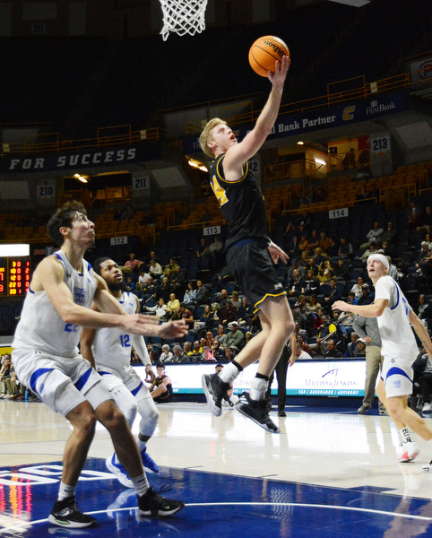 Staff Photo by Robin Rudd / UTC’s Garrison Kessler (24) drives to the basket. The University of Tennessee at Chattanooga Mocs hosted the Tennessee Wesleyan Bulldogs at McKenzie Arena on December 18, 2024.