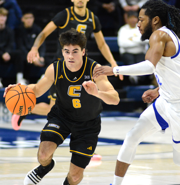Staff Photo by Robin Rudd / UTC’s Parker Robison (6) brings the ball up the court. The University of Tennessee at Chattanooga Mocs hosted the Tennessee Wesleyan Bulldogs at McKenzie Arena on December 18, 2024.