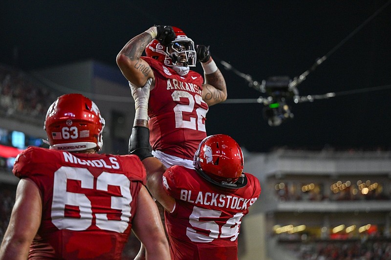 Ar razorback football news hotsell
