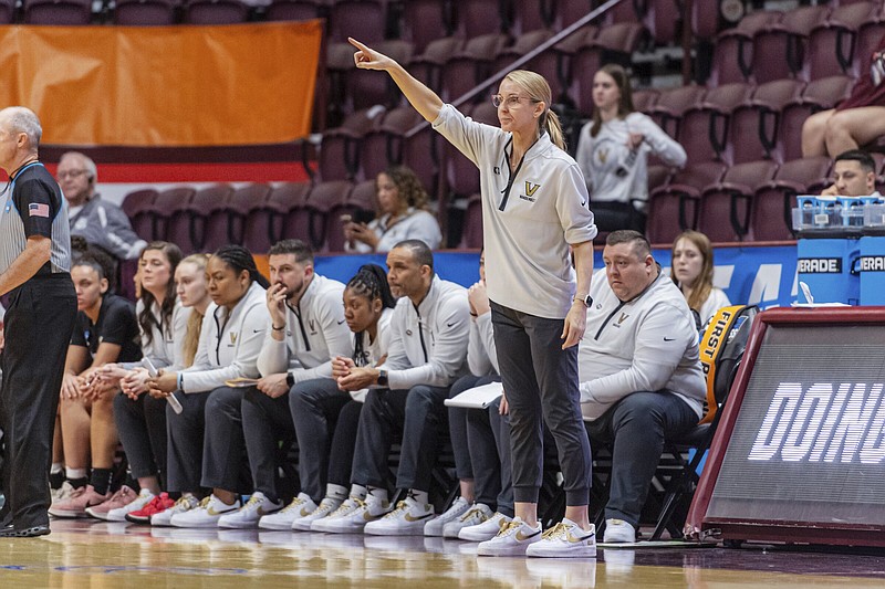 Vanderbilt coach Shea Ralph directs the team against Baylor during the second half of a first-round college basketball game in the women's NCAA Tournament in Blacksburg, Va., Friday, March 22, 2024. (AP Photo/Robert Simmons)