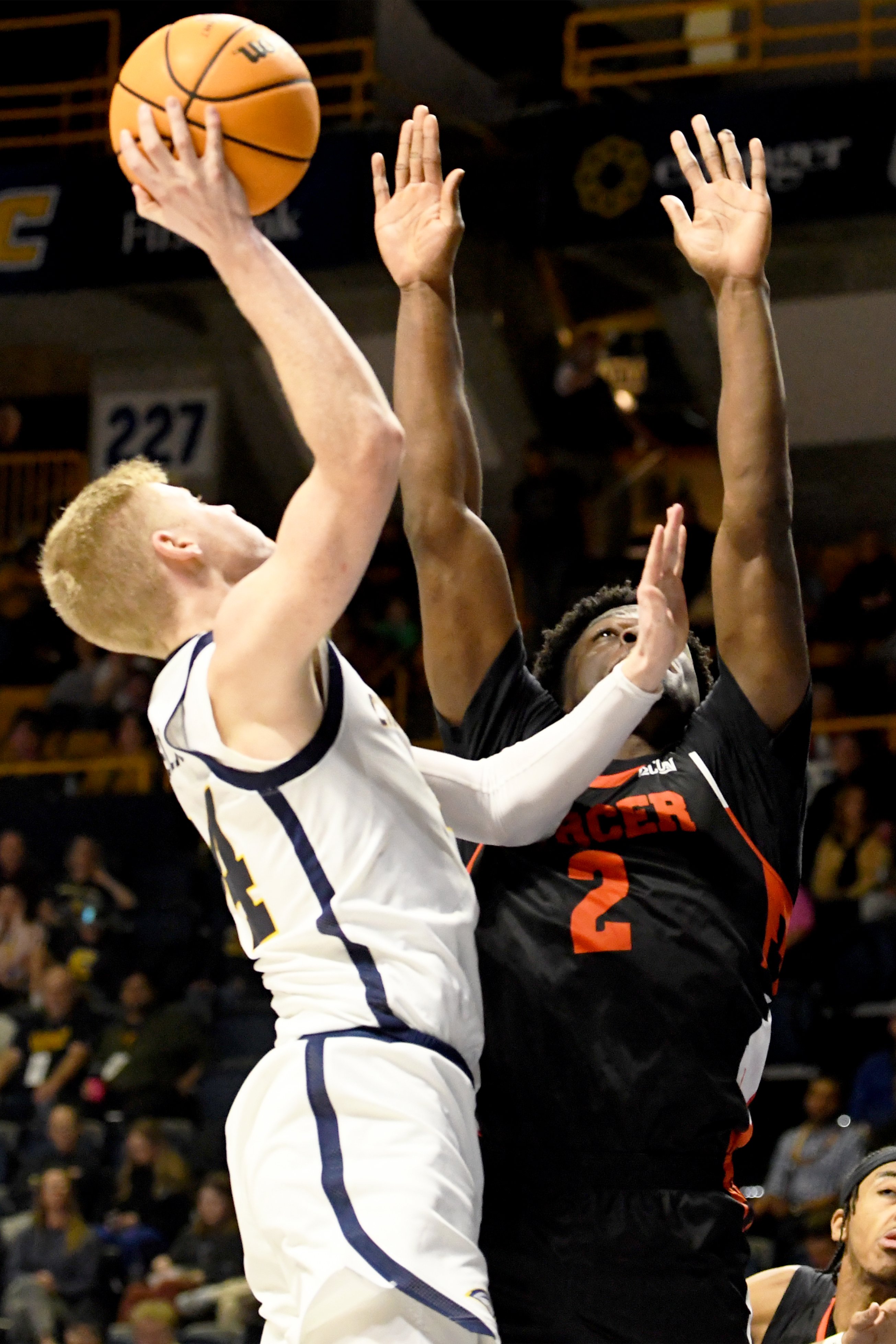 Staff photo by Abby White / Garrison Keeslar, 24, makes a two point shot for UTC. The University of Tennessee at Chattanooga Men’s Basketball team played Mercer on Saturday, February 1, 2025 in McKenzie Arena.
