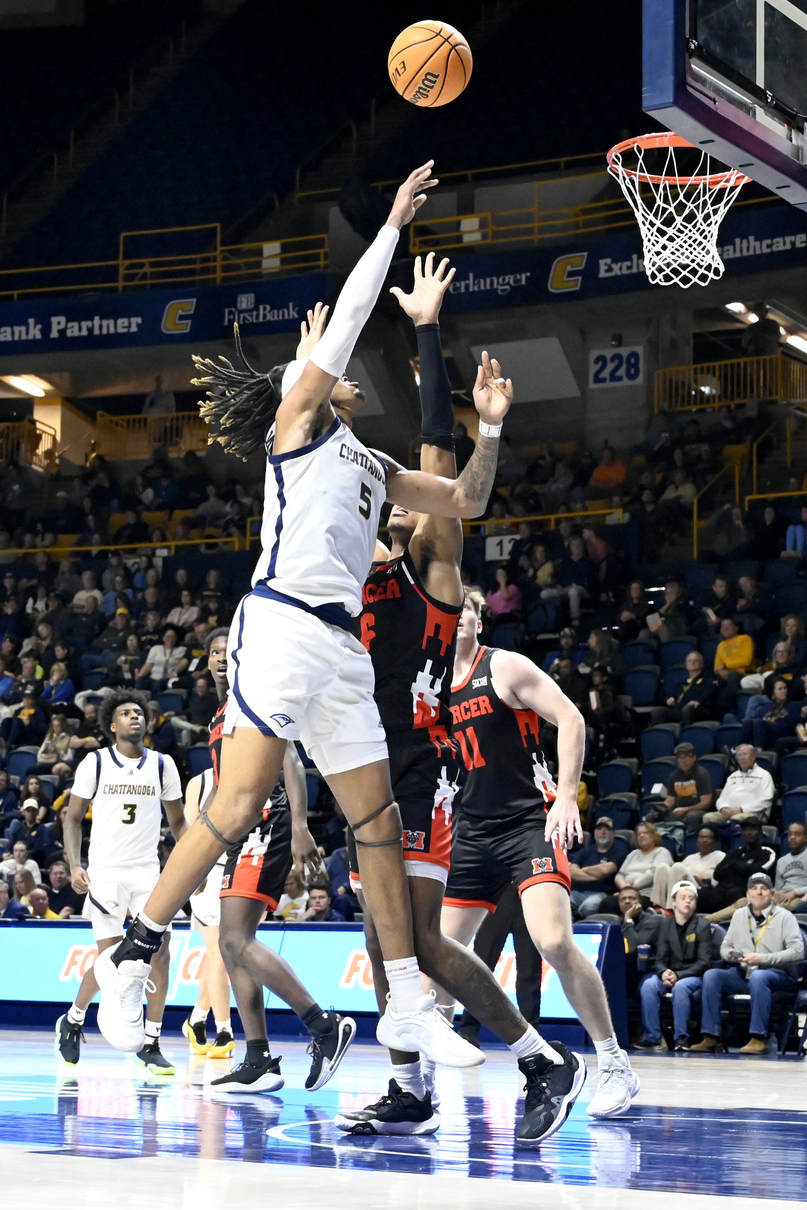 Staff photo by Abby White / Frank Champion, 5, makes a two point shot for UTC. The University of Tennessee at Chattanooga Men’s Basketball team played Mercer on Saturday, February 1, 2025 in McKenzie Arena.