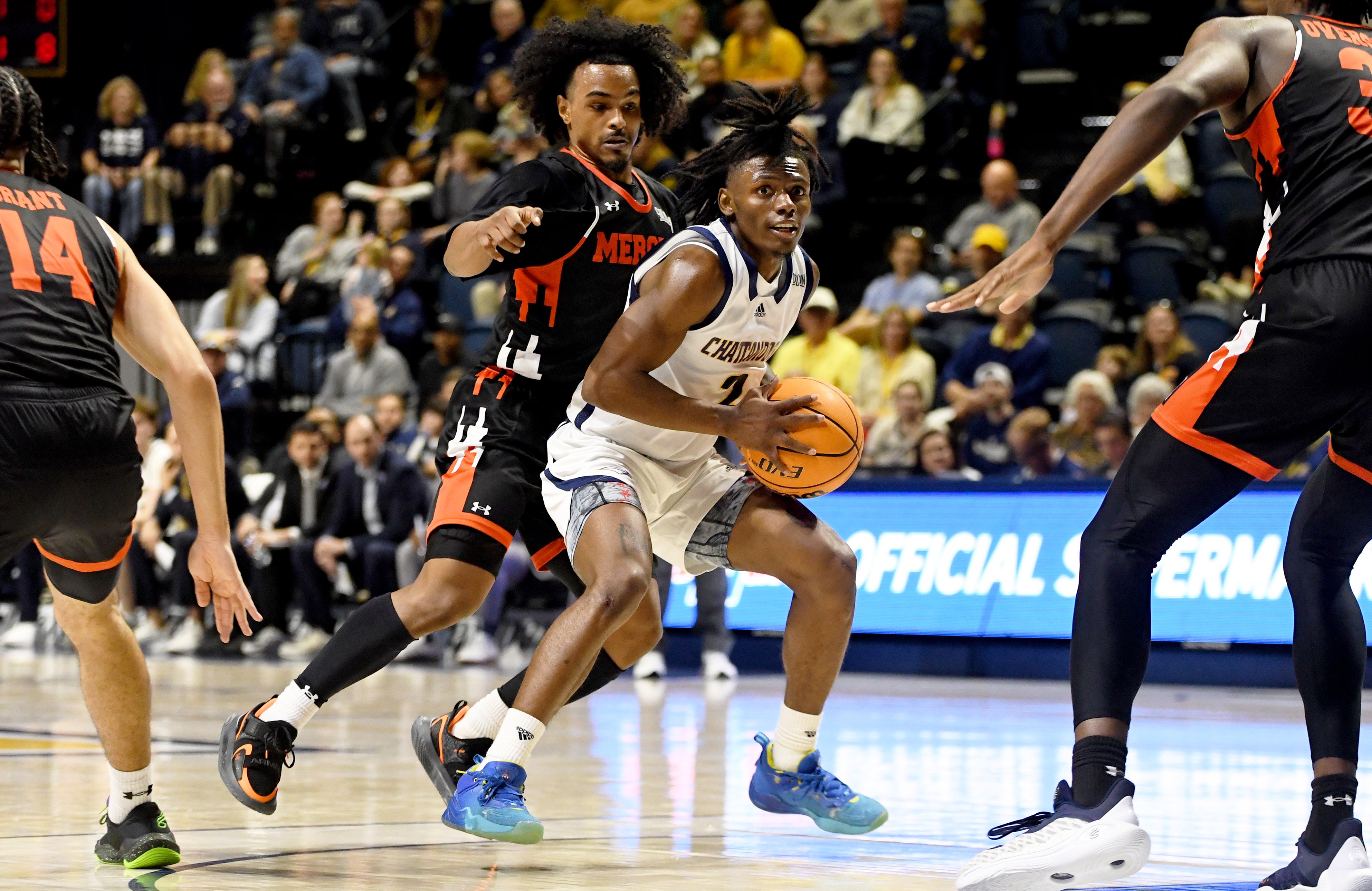 Staff photo by Abby White / Trey Bonham, 2, looks for an opening to pass. The University of Tennessee at Chattanooga Men’s Basketball team played Mercer on Saturday, February 1, 2025 in McKenzie Arena.