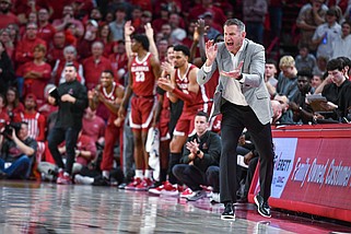 Alabama head coach Nate Oats reacts, Wednesday, Jan. 11, 2023, during the second half of the Crimson Tide’s 84-69 win over the Arkansas Razorbacks at Bud Walton Arena in Fayetteville. Visit nwaonline.com/photo for today's photo gallery..(NWA Democrat-Gazette/Hank Layton)