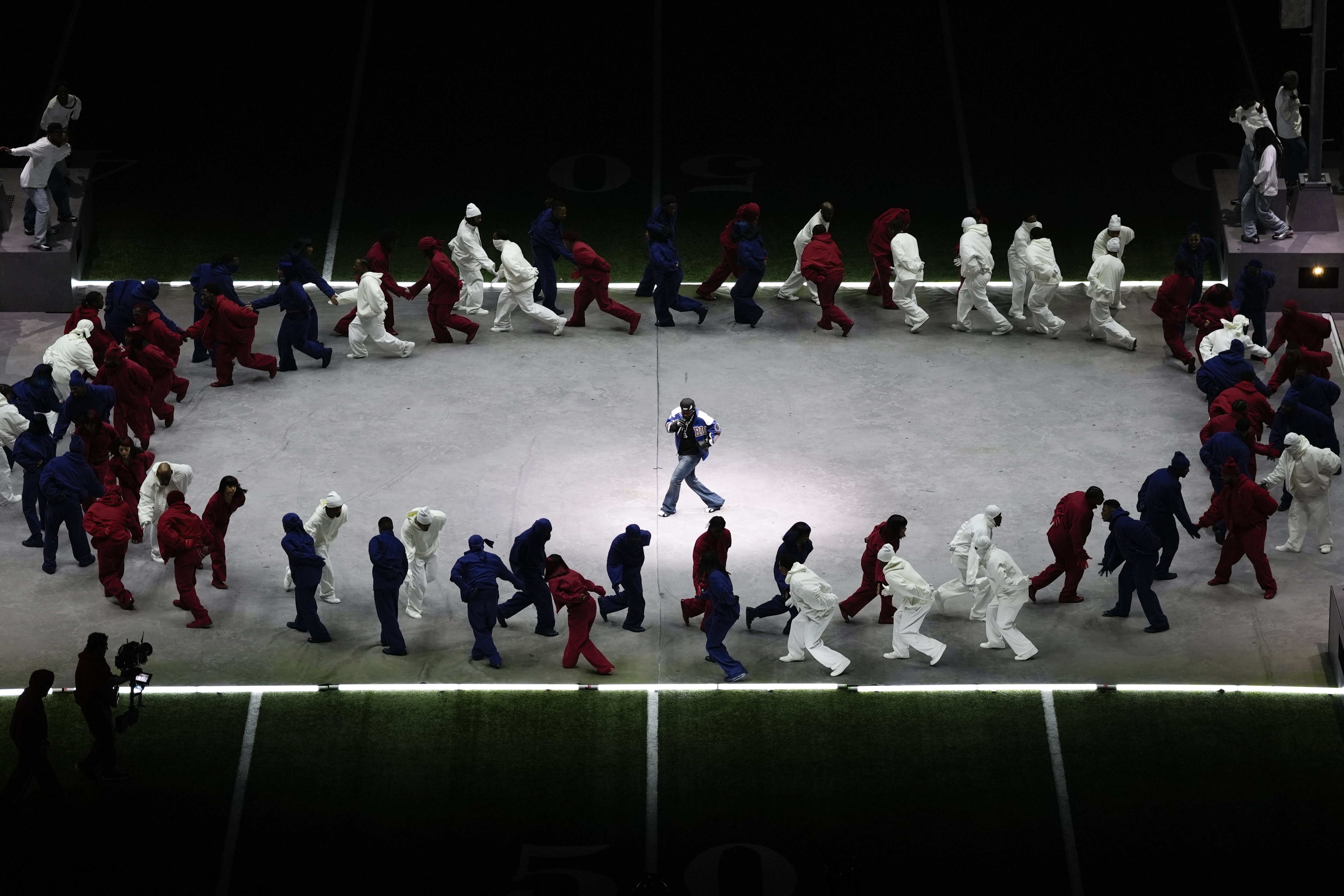 Kendrick Lamar performs during halftime of the NFL Super Bowl 59 football game between the Kansas City Chiefs and the Philadelphia Eagles, Sunday, Feb. 9, 2025, in New Orleans. (AP Photo/Charlie Riedel)