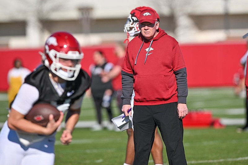 Arkansas football assistants Bobby Petrino, Deke Adams sign contract ...