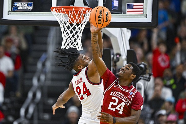‘2 dogs, 1 bone’: Richmond leads pack in UA’s physical win | Arkansas Democrat Gazette