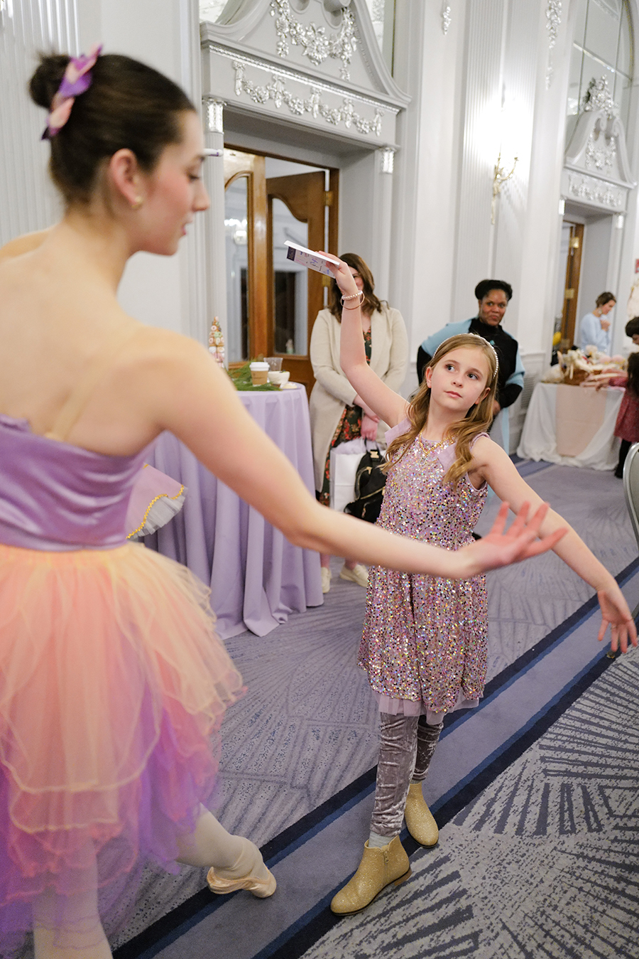 Photo by Mark Gilliland / Cora Vyule gets some ballet tips.