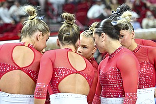 UA gymnasts stay alive and advance | Northwest Arkansas Democrat-Gazette