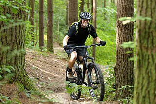 Staff photo by C.B. Schmelter / Dustin Whitley rides the Black Forest trial at Enterprise South Nature Park on Thursday, Aug. 27, 2020 in Chattanooga, Tenn. Whitley said he's at the park almost every day.