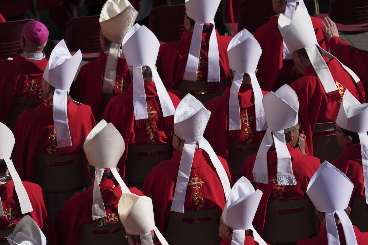 Clergy take their seats ahead of the funeral of Pope Francis in St. Peter's Square at the Vatican, Saturday, April 26, 2025. (AP Photo/Evan Vucci)
