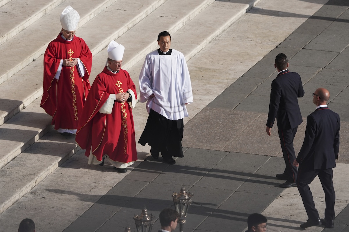 Cardinals arrive to be seated for the funeral of Pope Francis in St. Peter's Square at the Vatican, Saturday, April 26, 2025. (AP Photo/Evan Vucci)