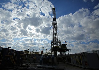 A Southwestern Energy natural gas drilling rig near Wonderview in Conway County, about 13 miles north of Morrilton, is shown in this Nov. 20, 2014, file photo. (Arkansas Democrat-Gazette file photo)