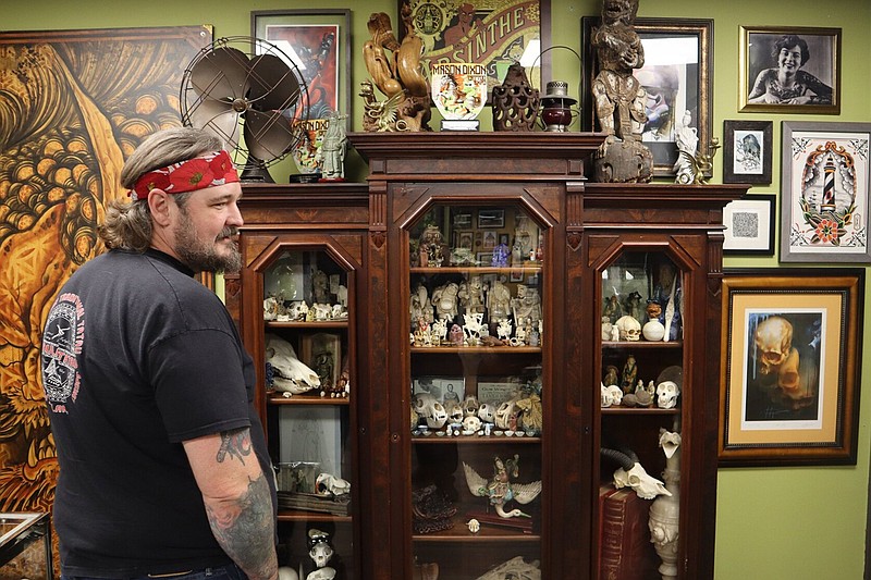 Black Cobra Tattoo Studio owner / Tattoo artist, Matt O’Baugh, shows off some of his favorite things at Black Cobra on May 28, 2025. (Arkansas Democrat-Gazette/Jesse Cain)