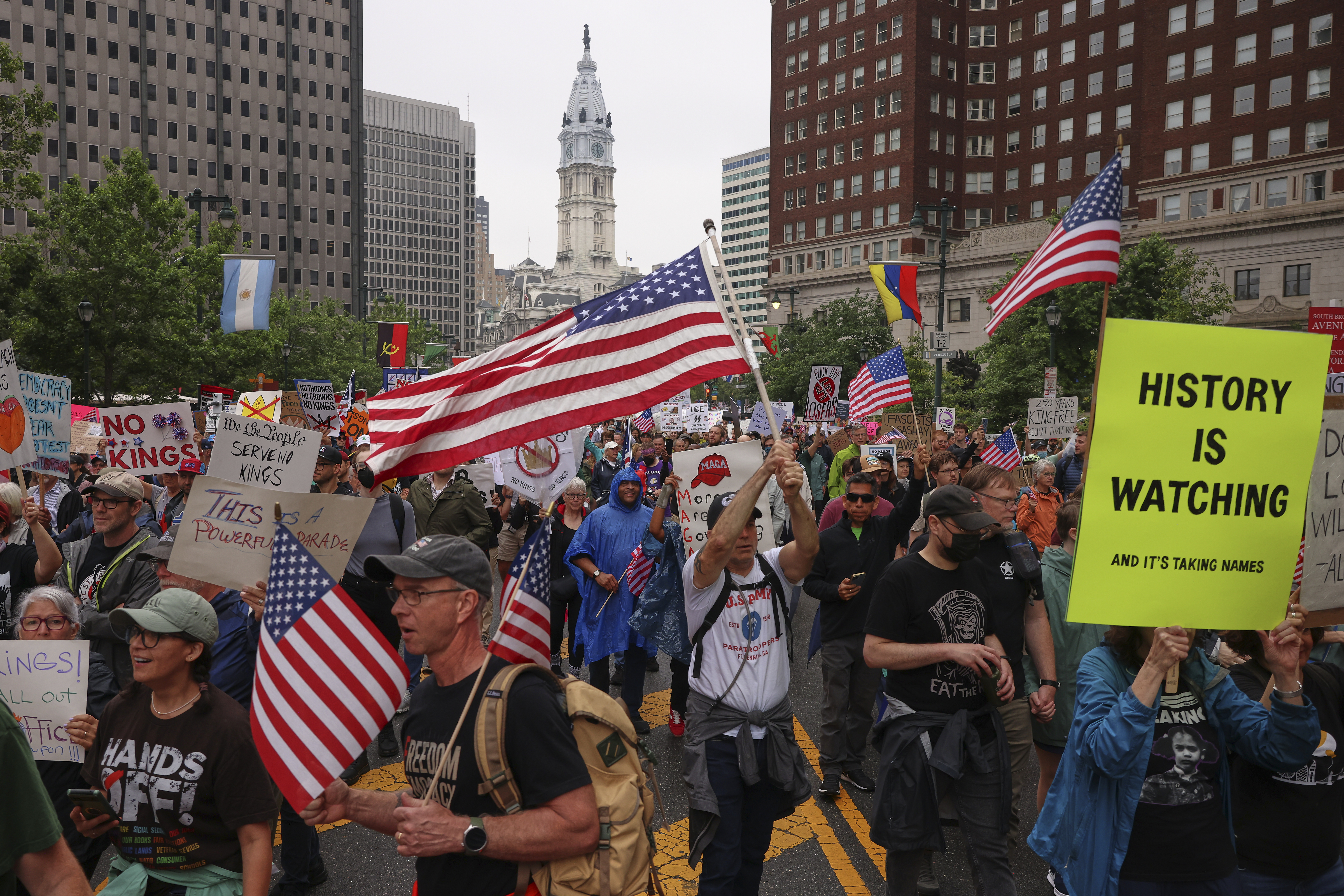 Demonstrators march during the "No Kings" protest, Saturday, June 14, 2025, in Philadelphia. (AP Photo/Yuki Iwamura)