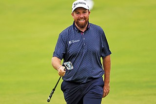 Lowry docked two shots when his golf ball moves a fraction of an inch ...