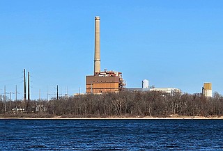 The Flint Creek Power Plant, a coal-fired plant operated by Southwestern Electric Power Co. (SWEPCO), is seen from the boat dock area along Swepco Lake in Gentry in this March 1, 2025, file photo. (Randy Moll/Westside Eagle Observer)